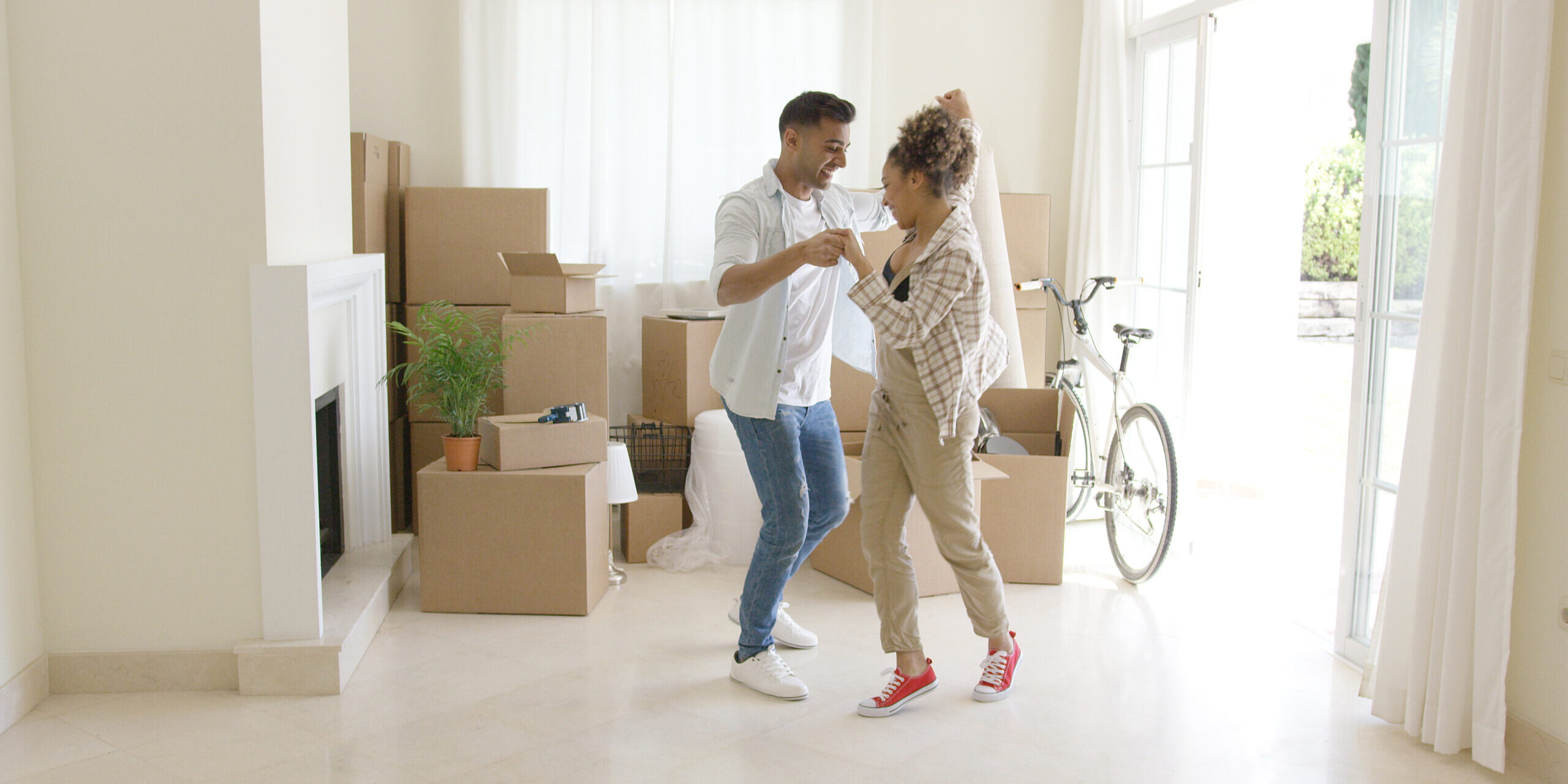 Happy couple starts home selling process with help from Susan Gregory's guide to selling your home